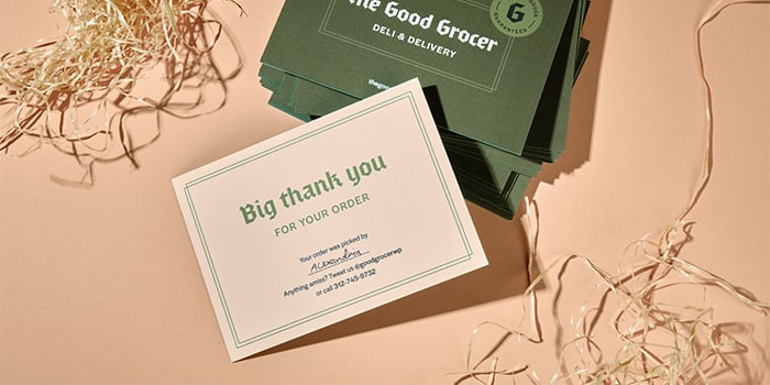 Grocery shop thank you postcard with a green back and a beige front