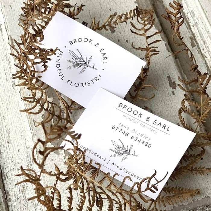 Brook & Earl recycled business cards and dried fern