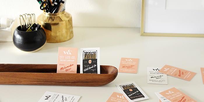 Wit and Co business cards on desk