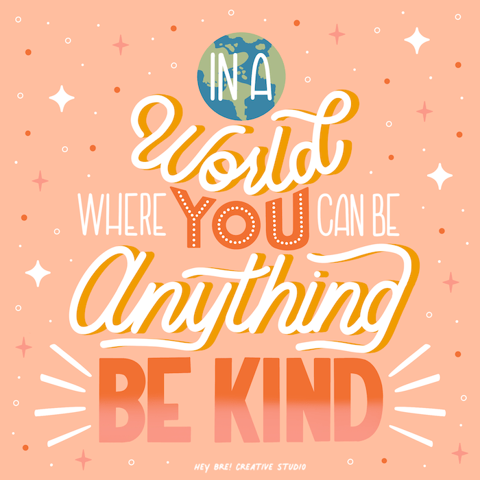 In a world where you can be anything be kind inspirational quote on orange background hand lettered by artist Breanna Christie from Hey Bre Creative Studio