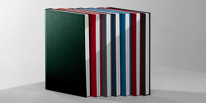 Range of seven hard cover notebooks in various colors by MOO