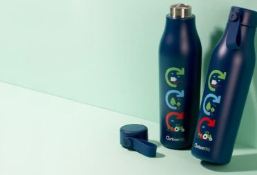 Two custom water bottles by Carbon180
