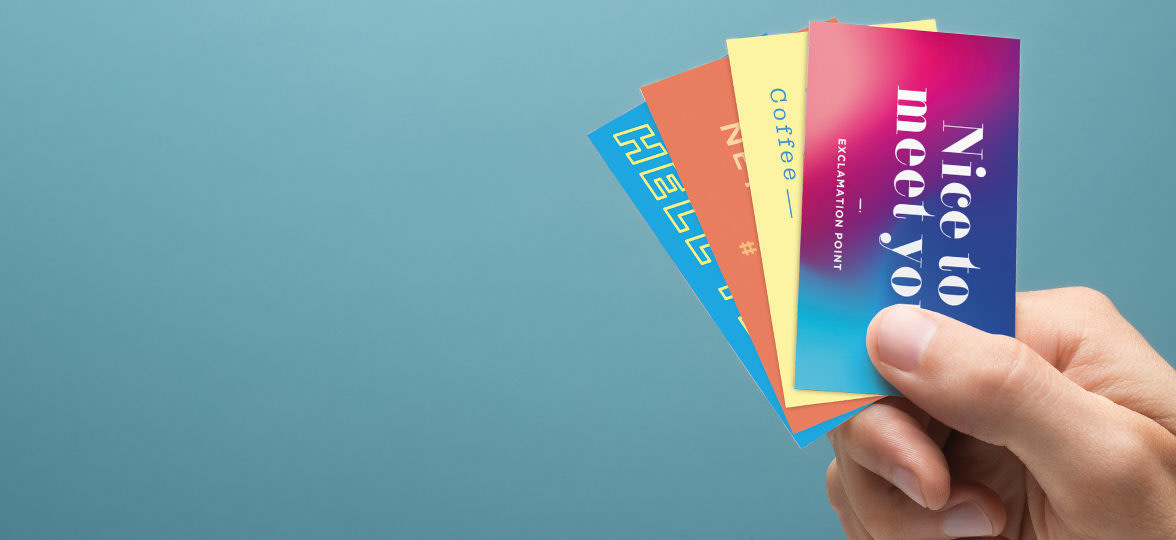 colorful business cards in hand