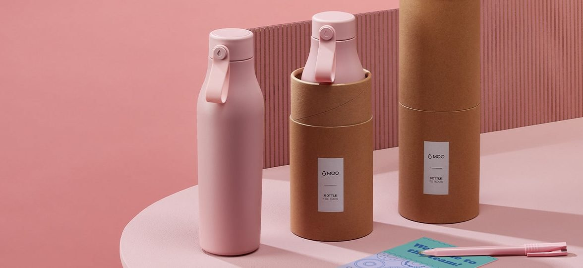 Pink reusable water bottle, pink bottle in its packaging, and drink bottle packaging by MOO