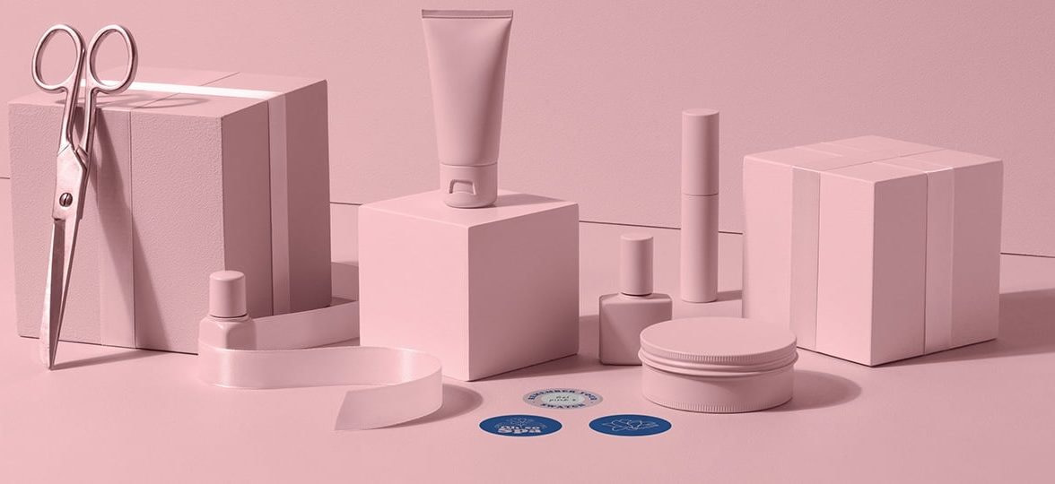 Pink packaging for beauty products and blue stickers