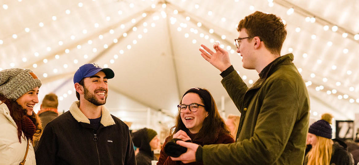 People chatting under the marquee at SoWa Boston winter festival
