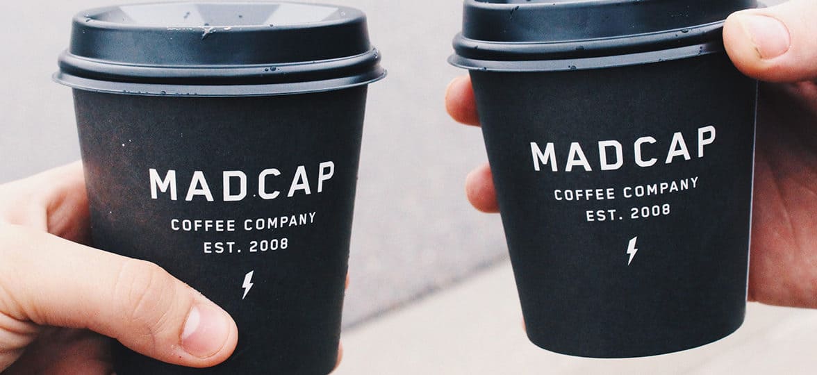 Madcap black disposable coffee cups