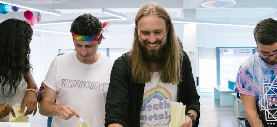 MOO employees celebrating pride and helping themselves to treats