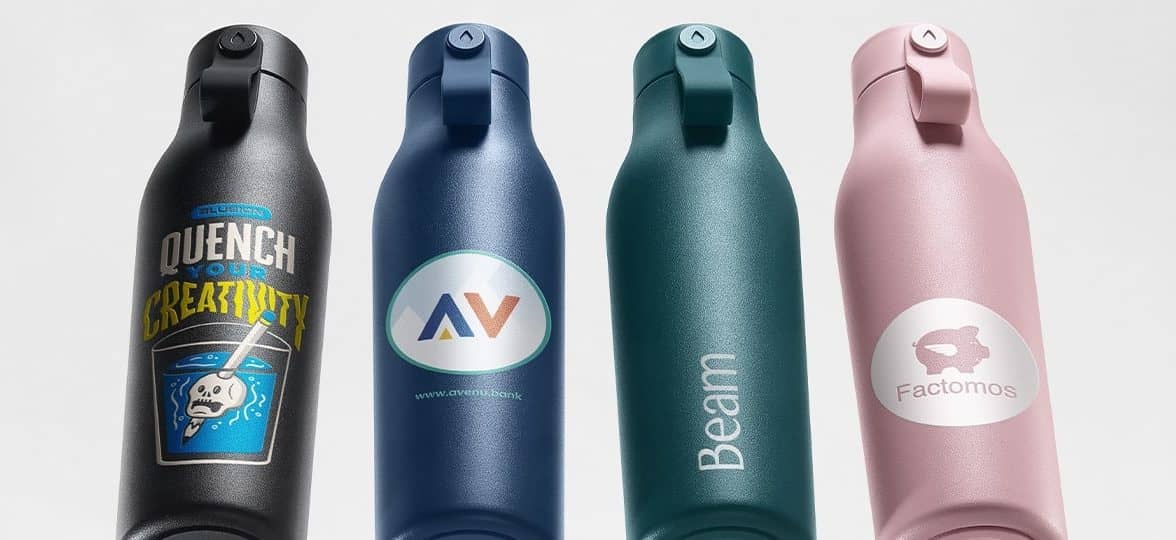 Four custom water bottles designed by MOO and customized by Blue Ion, MainStreet Bank, Beam, and Factomos