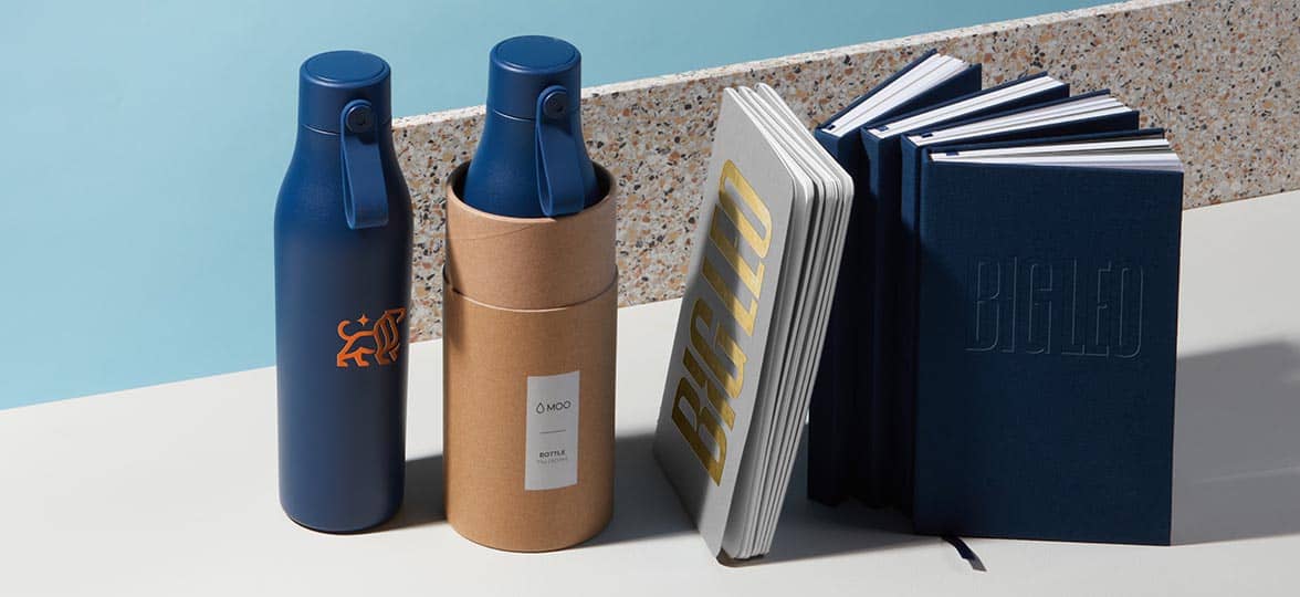 Big Leo water bottles and custom notebooks