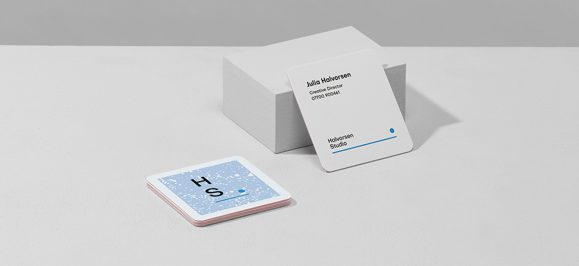 A corporate professional business card shown with a white backdrop