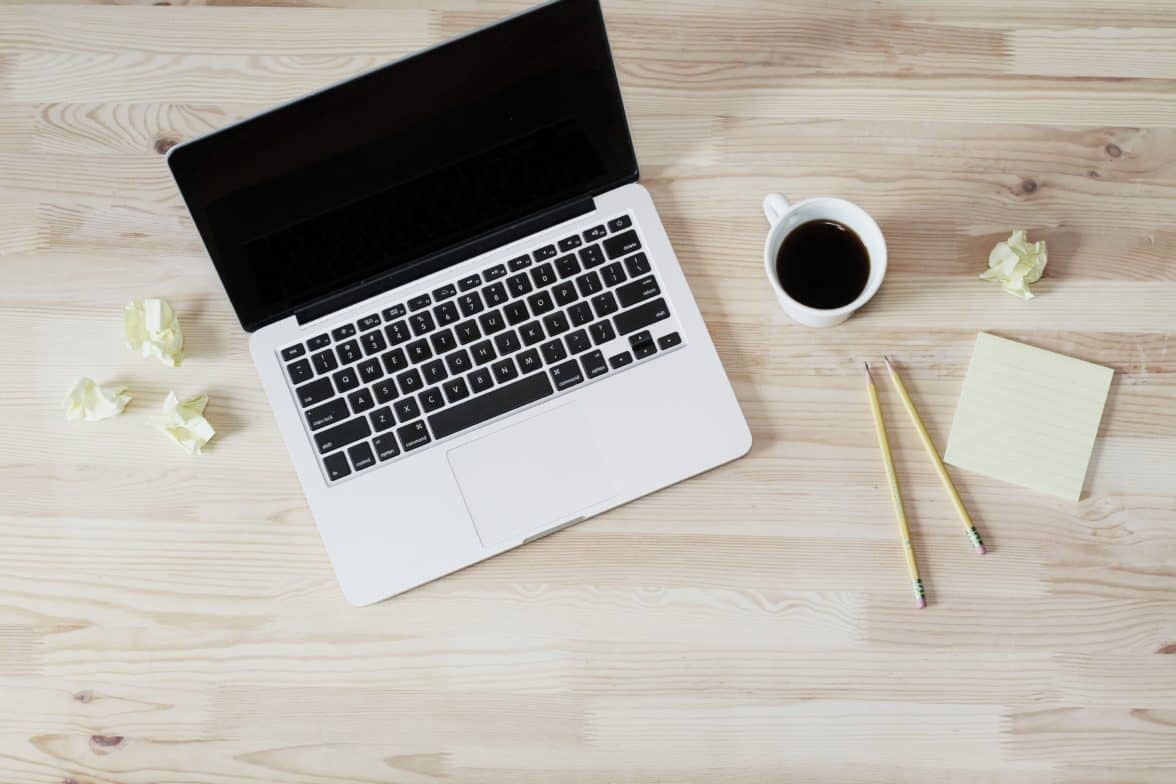 laptop on desk and coffee