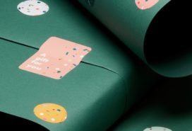 Green holiday packaging with MOO's round and rectangular stickers