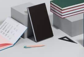 Collection of 7 colored hard cover notebooks for work