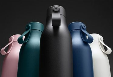 5 MOO water bottles in different colors including pink, green, black, blue and white