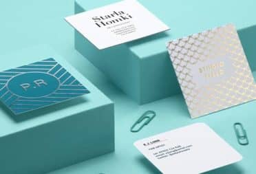 Square business cards in various designs and finishes
