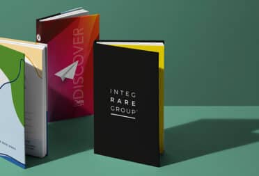 Three notebook cover designs from different corporate brands