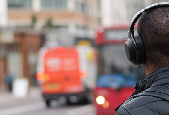 Person with headphones on the street