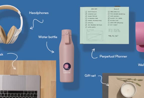 Multiple gift ideas including a water bottle, headphones, planner, standing desk, and gift set.