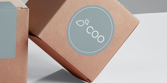 Grey sticker with COO logo on a box
