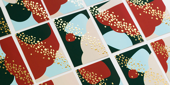 Mosaic of Pelikan print gold foil business card designs
