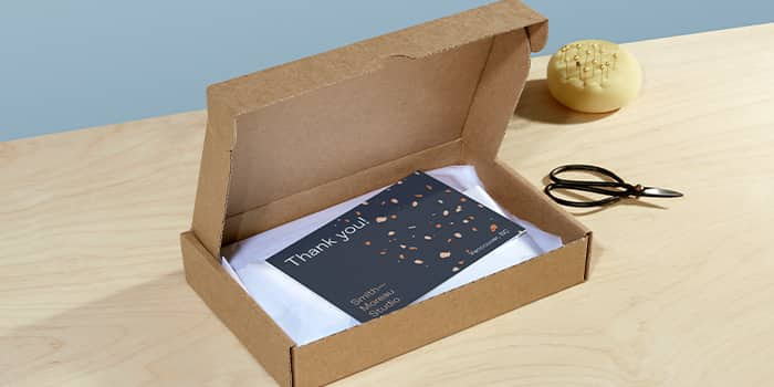 creative packaging with postcard