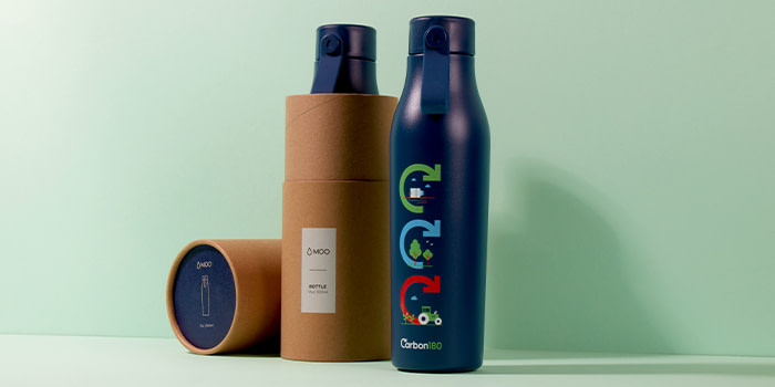 two Carbon180 eco-friendly reusable bottles and their packaging