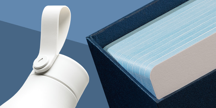 Blue business card box and white reusable water bottle by MOO