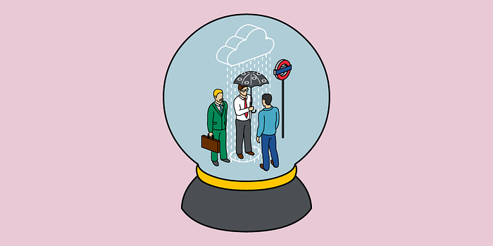Businessmen in a snow globe 