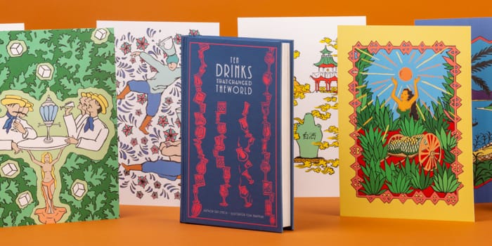 Tom Maryniak postcards and book standing