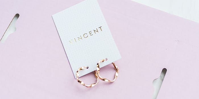 House of Vincent gold foil business cards used for earrings