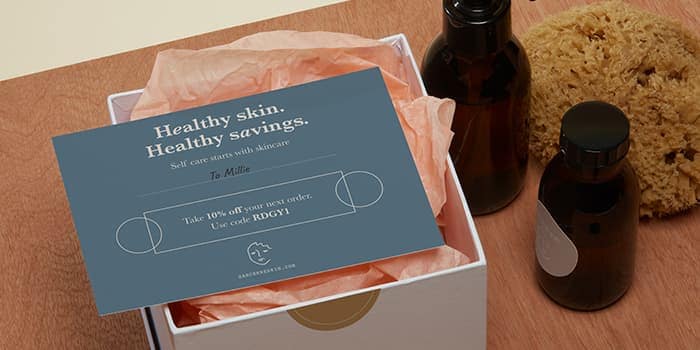 Promo card for a skincare brand on an open box