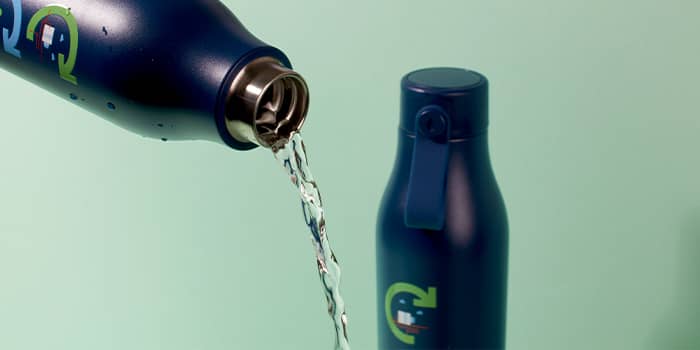 Carbon180 custom bottle pouring water