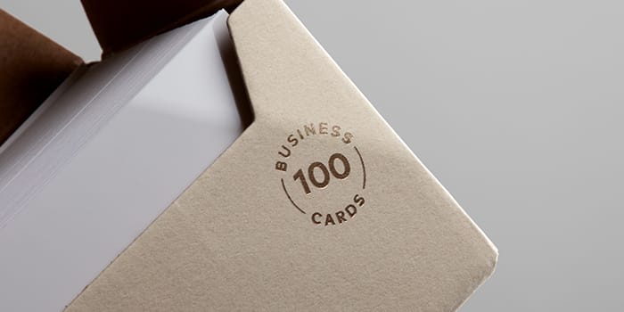 A MOO.com business card pack with silver foil finish 