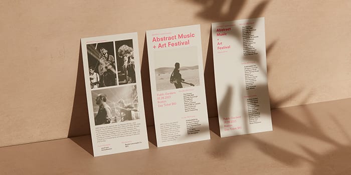 A selection of printed flyers advertising an abstract music festival.