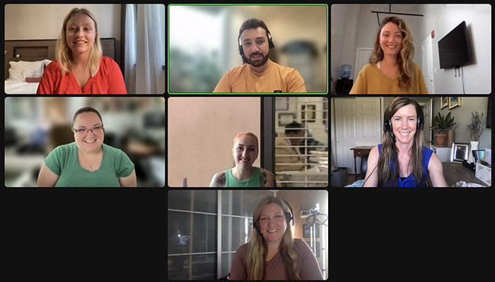 Screenshot of a Zoom grid with different sales team members who are working remotely.
