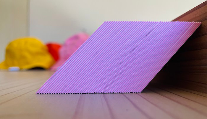 Thick business cards with a pink edge by Boushi Boots