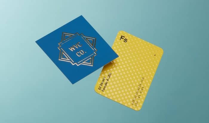 Gold foil square business card and yellow business card with spot UV design