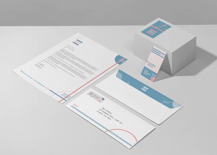 Consistently branded letterhead, envelope, and business cards ready to be sent.