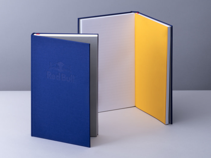 Redbull blue notebooks with yellow central pages