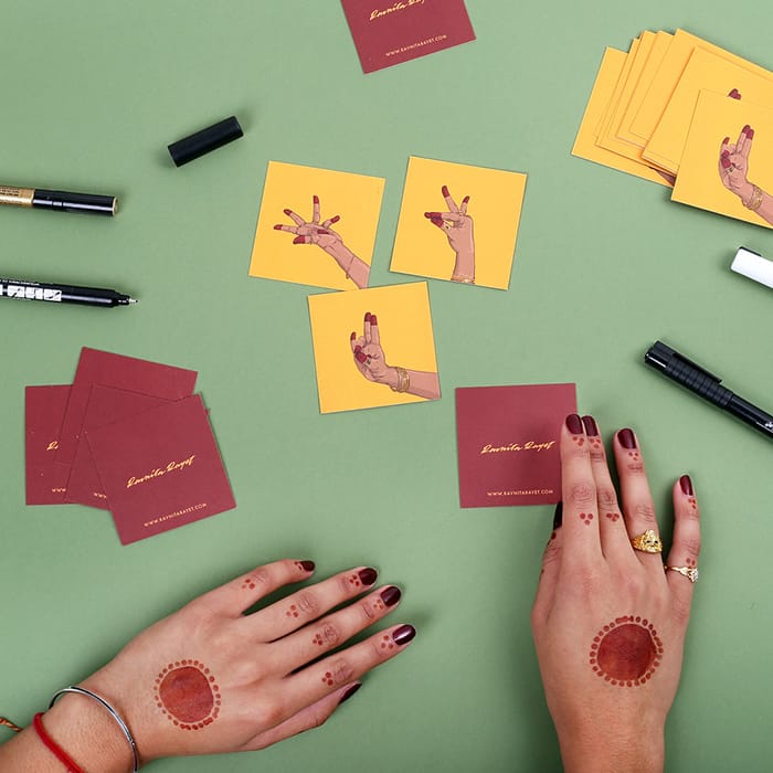 Ravnita Raynet square business cards with hands