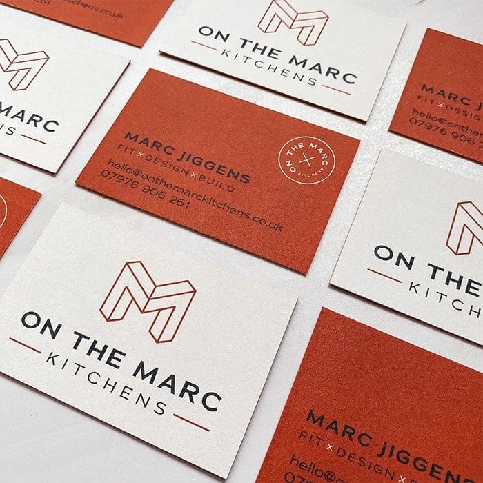 On the Marcs orange business cards by Lucy's Logos