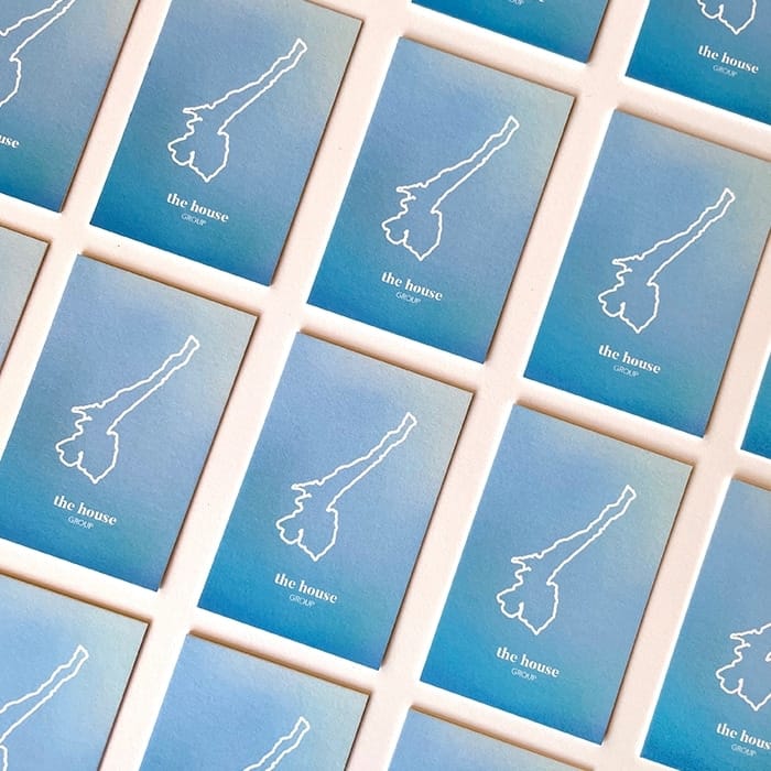 Mosaic of blue gradient business cards for the House Group by Old Flame design